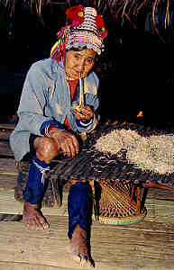 Akha Woman, Akha Village in Chiang Rai Province, Northern Thailand.